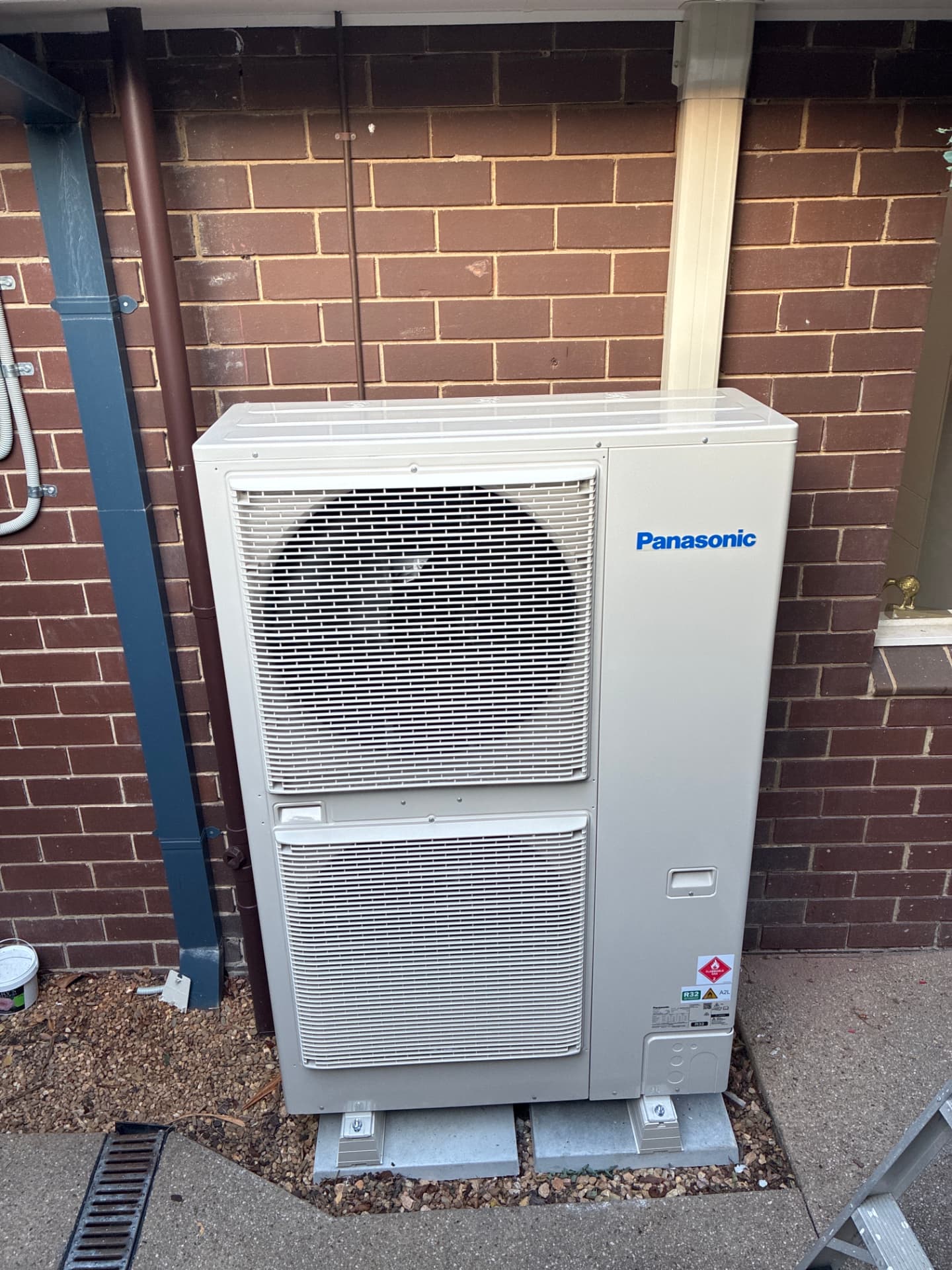 New ducted outdoor unit — brick home install